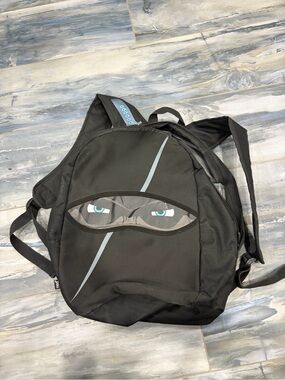 Black Novelty Ninja Eyes Backpack - Kid’s Bag- Zip-It